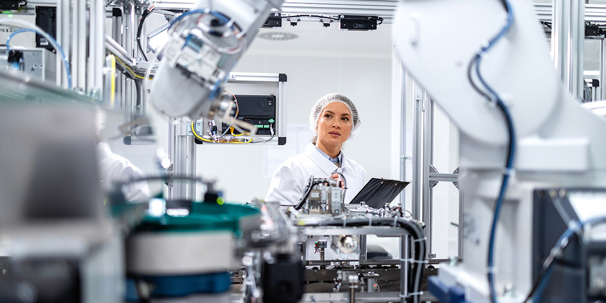 Female technician inspection precision machine